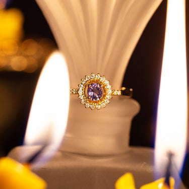 0.33ct natural alexandrite 18k yellow gold ring with diamond halo.